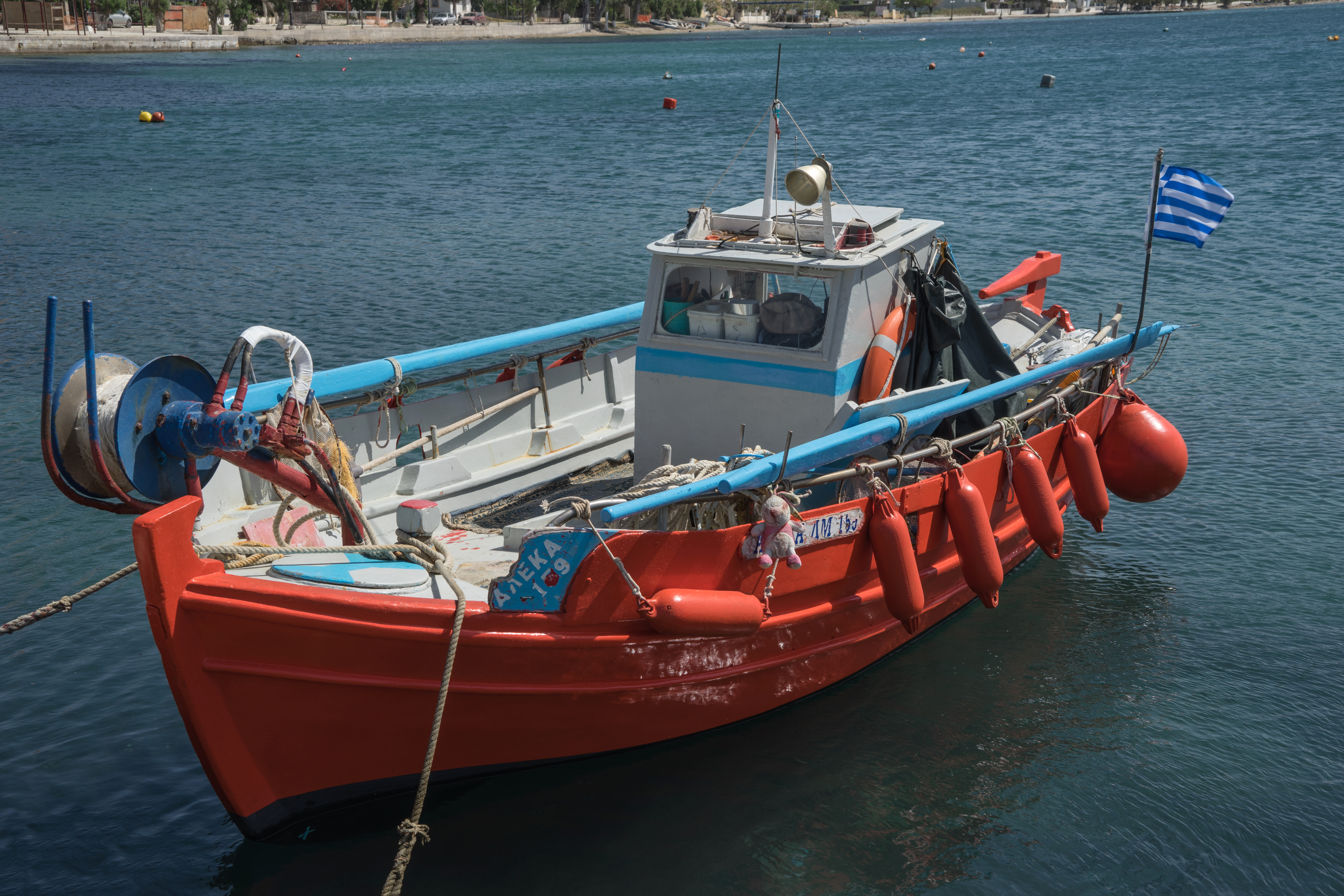Indonesian flag on a small boat at sea